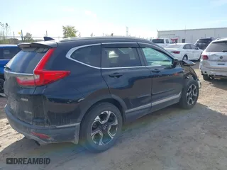 2017 Honda CR-V Touring with VIN 5J6RW2H96HL037854, listed as a IAAI auction lot 40472748 with 126,582 mi miles. Bid and sale history available at carsss.com. Image 4.