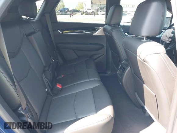 2023 Cadillac XT5 FWD Premium Luxury z VIN 1GYKNCRS3PZ176654, wystawiony jako IAAI lot #42136259 z przebiegiem 20 403 mil mil oraz . Historia ofert i sprzedaży dostępna na DreamBid. Obrazek 8.