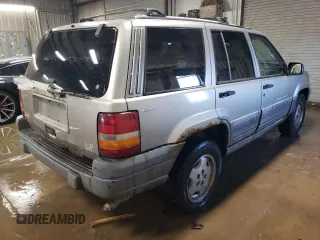 1997 Jeep Grand Cherokee Laredo with VIN 1J4GZ58Y7VC650813, listed as a Copart auction lot 41486724 with 266,004 mi miles and Salvage Title. Bid and sale history available at carsss.com. Image 3.