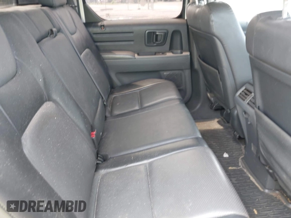 2006 Honda Ridgeline RTL with VIN 2HJYK16566H550339, listed as a IAAI auction lot 42223323 with 240,372 mi miles and . Bid and sale history available at DreamBid. Image 8.