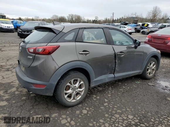 2018 Mazda CX-3 Sport z VIN JM1DKFB77J0312732, wystawiony jako Copart lot #45720065 z przebiegiem 99 866 mil mil oraz Szkoda całkowita • Salvage title. Historia ofert i sprzedaży dostępna na DreamBid. Obrazek 3.