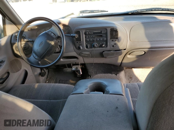 1998 Ford F-150 z VIN 1FTZX18W3WKB01774, wystawiony jako Copart lot #88670315 z przebiegiem 102 301 mil mil oraz Szkoda całkowita • Salvage title. Historia ofert i sprzedaży dostępna na DreamBid. Obrazek 8.