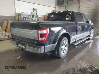 2021 Ford F-150 XL with VIN 1FTFW1E8XMFA47553, listed as a IAAI auction lot 41496255 with 83,711 mi miles. Bid and sale history available at carsss.com. Image 4.