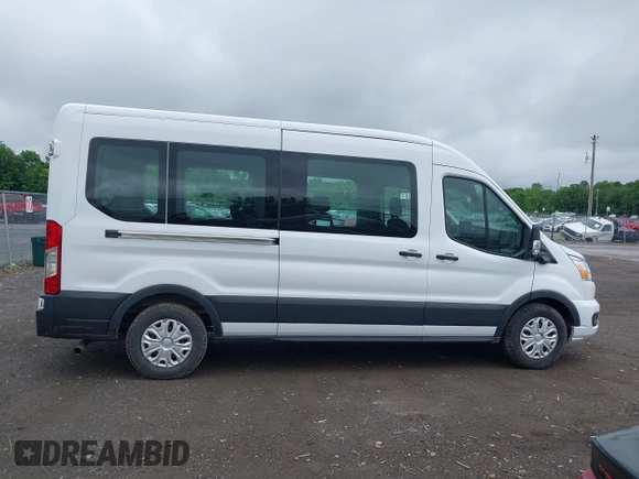 2022 Ford Transit Passenger XL with VIN 1FBAX2C86NKA79221, listed as a IAAI auction lot 42427641 with 56,245 mi miles and . Bid and sale history available at DreamBid. Image 13.
