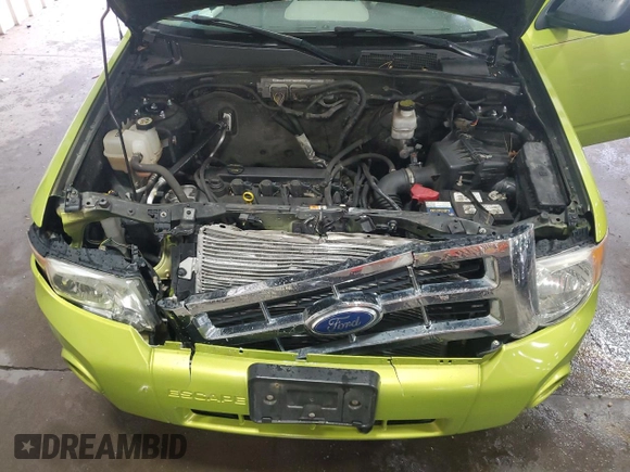 2012 Ford Escape XLT with VIN 1FMCU9D7XCKA07488, listed as a Copart auction lot 58605185 with 144,578 mi miles and Salvage title. Bid and sale history available at DreamBid. Image 12.