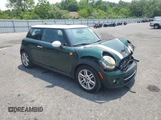 2011 MINI Hardtop with VIN WMWSU3C51BTX95581, listed as a Copart auction lot 60443995 with 157,213 mi miles and Salvage title. Bid and sale history available at DreamBid. Image 4.