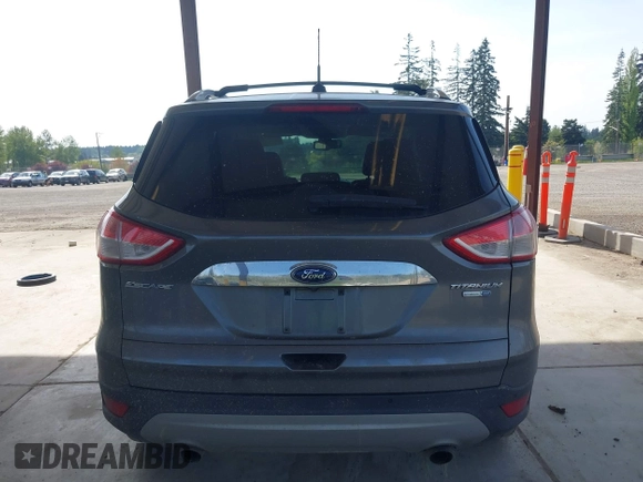 2014 Ford Escape Titanium with VIN 1FMCU9JX0EUC45801, listed as a IAAI auction lot 42121561 with 80,217 mi miles and . Bid and sale history available at DreamBid. Image 16.