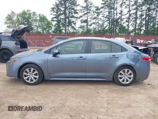 2021 Toyota Corolla LE with VIN JTDEPMAE8MJ162896, listed as a IAAI auction lot 41942669 with 99,131 mi miles. Bid and sale history available at carsss.com. Image 14.