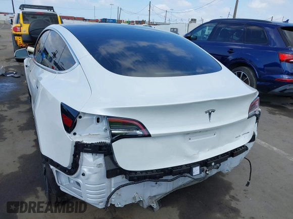 2020 Tesla Model 3 Long Range with VIN 5YJ3E1EB9LF795246, listed as a IAAI auction lot 41895750 with 163,061 mi miles and . Bid and sale history available at DreamBid. Image 6.