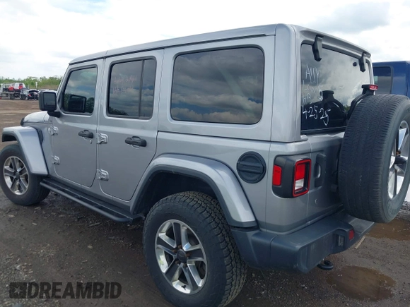 2019 Jeep Wrangler Unlimited Sahara with VIN 1C4HJXEN5KW542403, listed as a IAAI auction lot 42159197 with 60,378 mi miles and . Bid and sale history available at DreamBid. Image 3.