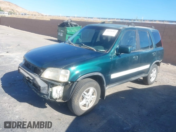 1999 Honda CR-V EX with VIN JHLRD1860XC028421, listed as a IAAI auction lot 39978382 with 222,122 mi miles. Bid and sale history available at carsss.com. Image 2.