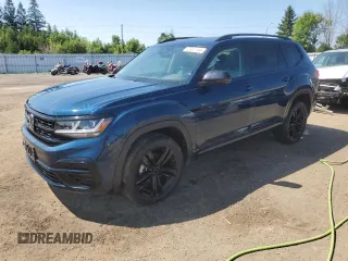 2023 Volkswagen Atlas SEL R-Line Black z VIN 1V2SR2CA9PC516833, wystawiony jako Copart lot #62933104 z przebiegiem 24 908 mil mil oraz Szkoda całkowita • Salvage title. Historia ofert i sprzedaży dostępna na DreamBid. Obrazek 1.