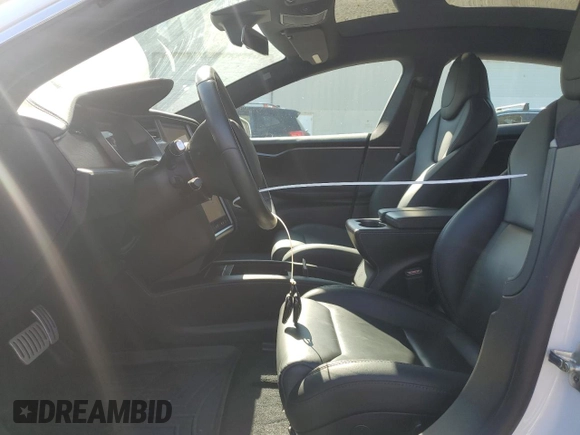 2019 Tesla Model S 100D with VIN 5YJSA1E41KF330631, listed as a Copart auction lot 55360295 with 52,245 mi miles and Salvage title. Bid and sale history available at DreamBid. Image 7.