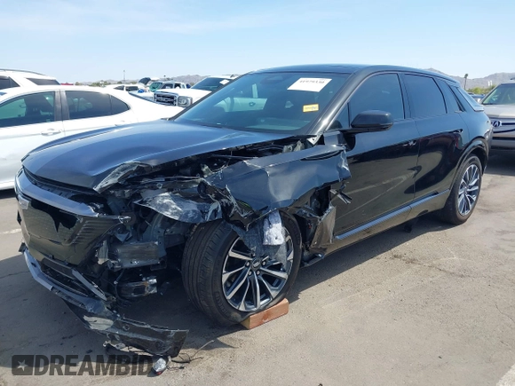 2024 Cadillac LYRIQ Sport z VIN 1GYKPVRK6RZ131099, wystawiony jako IAAI lot #41979330 z przebiegiem 3953 mil mil oraz . Historia ofert i sprzedaży dostępna na DreamBid. Obrazek 19.