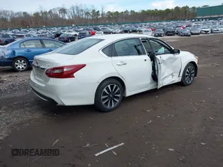2018 Nissan Altima SR with VIN 1N4AL3APXJC283392, listed as a IAAI auction lot 41214643 with 126,720 mi miles and . Bid and sale history available at DreamBid. Image 4.