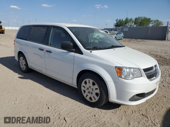 2020 Dodge Grand Caravan SE with VIN 2C4RDGBG3LR155912, listed as a Copart auction lot 52516385 with 255,986 mi miles and Clean Title. Bid and sale history available at DreamBid. Image 4.