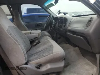 1999 Ford F-150 с VIN 2FTZX1729XCA25031, выставлен на аукционе Copart как лот 46941615 с пробегом 310 800 миль миль и Списание • Salvage title. История ставок и продаж доступна на DreamBid. Изображение 7.