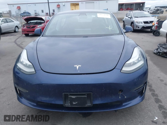 2021 Tesla Model 3 Long Range with VIN 5YJ3E1EB8MF848049, listed as a IAAI auction lot 40974331 with 61,462 mi miles. Bid and sale history available at carsss.com. Image 12.