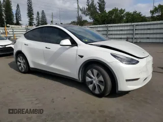 2020 Tesla Model Y Long Range z VIN 5YJYGDEE2LF049815, wystawiony jako Copart lot #53738165 z przebiegiem 113 779 mil mil oraz Szkoda całkowita • Salvage title. Historia ofert i sprzedaży dostępna na DreamBid. Obrazek 4.