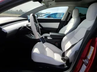 2021 Tesla Model 3 Standard Range Plus with VIN 5YJ3E1EA9MF870214, listed as a Copart auction lot 47702535 with 46,486 mi miles and Salvage Title. Bid and sale history available at DreamBid. Image 7.