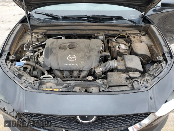 2021 Mazda CX-30 S with VIN 3MVDMAAL5MM303863, listed as a Copart auction lot 54946935 with 71,968 mi miles and Salvage title. Bid and sale history available at DreamBid. Image 12.