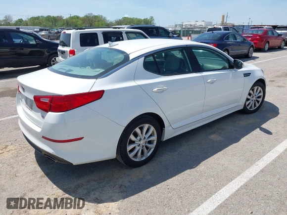 2015 Kia Optima LX with VIN 5XXGM4A76FG443962, listed as a IAAI auction lot 42069701 with 101,516 mi miles. Bid and sale history available at carsss.com. Image 4.