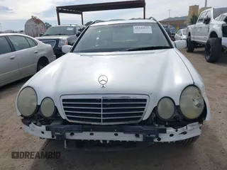 2001 Mercedes-Benz E-Class with VIN WDBJH65J31B364290, listed as a IAAI auction lot 41545677 with 162,040 mi miles. Bid and sale history available at carsss.com. Image 13.
