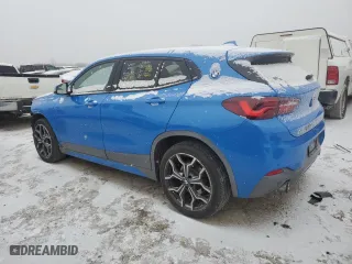 2021 BMW X2 xDrive28i with VIN WBXYJ1C05M5S44997, listed as a Copart auction lot 83067164 with 33,067 mi miles and Salvage Title. Bid and sale history available at carsss.com. Image 2.