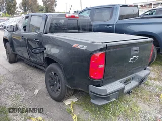 2019 Chevrolet Colorado 4WD Z71 with VIN 1GCGTDEN5K1289956, listed as a IAAI auction lot 41729406 with 60,887 mi miles. Bid and sale history available at carsss.com. Image 3.