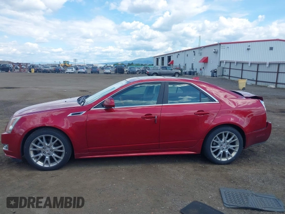 2012 Cadillac CTS Premium z VIN 1G6DS5E31C0104841, wystawiony jako IAAI lot #42292295 z przebiegiem 124 477 mil mil oraz . Historia ofert i sprzedaży dostępna na DreamBid. Obrazek 14.