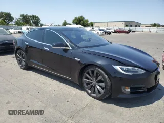 2016 Tesla Model S 90D z VIN 5YJSA1E29GF158774, wystawiony jako Copart lot #60143405 z przebiegiem Nie podano mil oraz Szkoda całkowita • Salvage title. Historia ofert i sprzedaży dostępna na DreamBid. Obrazek 4.
