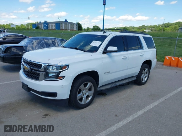 2015 Chevrolet Tahoe LT with VIN 1GNSKBKC8FR194164, listed as a IAAI auction lot 42315215 with 211,797 mi miles and . Bid and sale history available at DreamBid. Image 19.