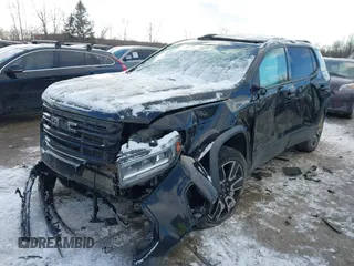 2021 GMC Acadia SLT z VIN 1GKKNULS4MZ179132, wystawiony jako IAAI lot #41349544 z przebiegiem 77 662 mil mil oraz . Historia ofert i sprzedaży dostępna na DreamBid. Obrazek 2.