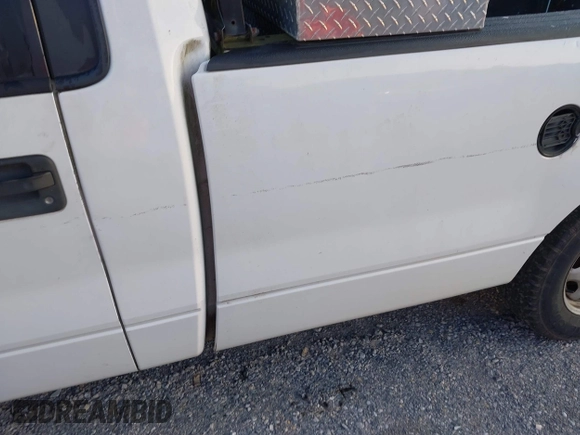 2011 Ford F-150 XL with VIN 1FTMF1CM9BKD39108, listed as a IAAI auction lot 42622177 with 211,312 mi miles and . Bid and sale history available at DreamBid. Image 17.