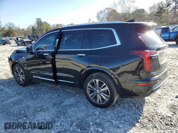 2021 Cadillac XT6 Premium Luxury z VIN 1GYKPDRS6MZ150397, wystawiony jako Copart lot #85137654 z przebiegiem 52 305 mil mil oraz Szkoda całkowita • Salvage title. Historia ofert i sprzedaży dostępna na DreamBid. Obrazek 2.