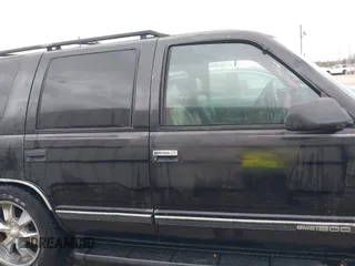 1998 GMC Yukon with VIN 1GKEC13R8WJ711255, listed as a IAAI auction lot 41457304 with 291,211 mi miles. Bid and sale history available at carsss.com. Image 13.