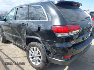 2021 Jeep Grand Cherokee Laredo X with VIN 1C4RJFAG7MC502866, listed as a IAAI auction lot 41841328 with 59,870 mi miles and . Bid and sale history available at DreamBid. Image 6.