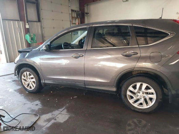 2015 Honda CR-V EX with VIN 3CZRM3H57FG706605, listed as a IAAI auction lot 41233942 with 112,842 mi miles. Bid and sale history available at carsss.com. Image 15.