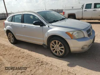 2011 Dodge Caliber Heat z VIN 1B3CB5HA7BD222260, wystawiony jako Copart lot #54451535 z przebiegiem 124 930 mil mil oraz Czysty tytuł • Clean title. Historia ofert i sprzedaży dostępna na DreamBid. Obrazek 4.
