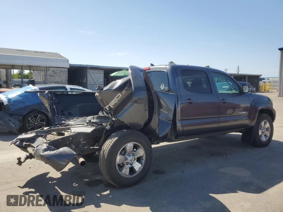 2015 Toyota Tacoma with VIN 3TMMU4FN7FM078006, listed as a Copart auction lot 59129495 with 244,062 mi miles and Salvage title. Bid and sale history available at DreamBid. Image 3.