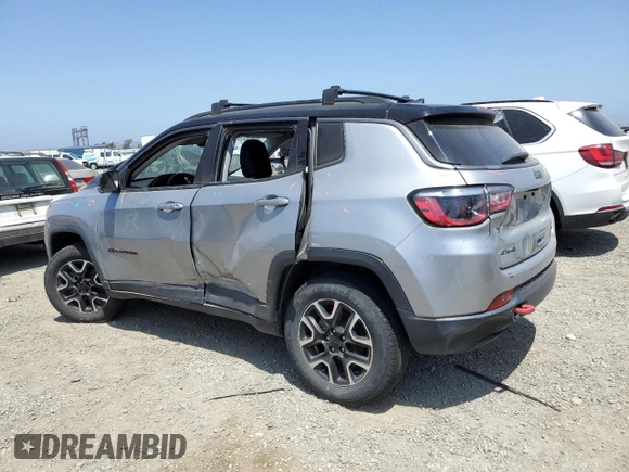 2021 Jeep Compass Trailhawk with VIN 3C4NJDDB6MT564816, listed as a Copart auction lot 57534505 with 87,177 mi miles and Salvage title. Bid and sale history available at DreamBid. Image 2.