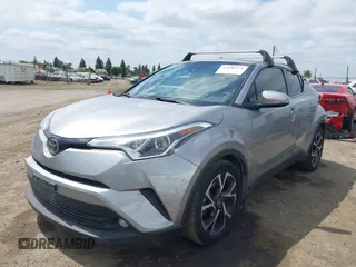 2019 Toyota C-HR XLE with VIN JTNKHMBX3K1016723, listed as a IAAI auction lot 42040571 with 158,804 mi miles. Bid and sale history available at carsss.com. Image 14.