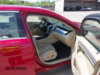 2014 Ford Taurus SEL z VIN 1FAHP2E89EG126922, wystawiony jako IAAI lot #42236235 z przebiegiem 176 917 mil mil oraz . Historia ofert i sprzedaży dostępna na DreamBid. Obrazek 5.