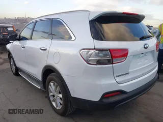 2016 Kia Sorento LX with VIN 5XYPG4A38GG075284, listed as a IAAI auction lot 41233974 with 126,044 mi miles. Bid and sale history available at carsss.com. Image 3.