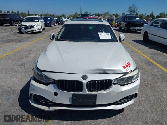 2015 BMW 4 Series 428i with VIN WBA4A5C58FGK15335, listed as a IAAI auction lot 41723243 with 152,652 mi miles and . Bid and sale history available at DreamBid. Image 6.