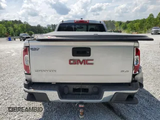 2016 GMC Canyon z VIN 1GTH5CE3XG1372815, wystawiony jako Copart lot #55076495 z przebiegiem 123 485 mil mil oraz Szkoda całkowita • Salvage title. Historia ofert i sprzedaży dostępna na DreamBid. Obrazek 6.