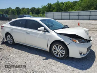 2014 Toyota Avalon Limited z VIN 4T1BK1EB4EU089540, wystawiony jako Copart lot #56886765 z przebiegiem 88 278 mil mil oraz Szkoda całkowita • Salvage title. Historia ofert i sprzedaży dostępna na DreamBid. Obrazek 4.