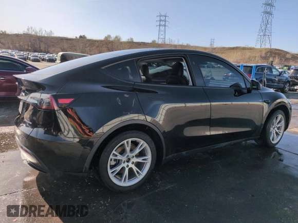 2023 Tesla Model Y Long Range with VIN 7SAYGDEE5PF850358, listed as a Copart auction lot 52581615 with 19,376 mi miles and Salvage Title. Bid and sale history available at DreamBid. Image 3.