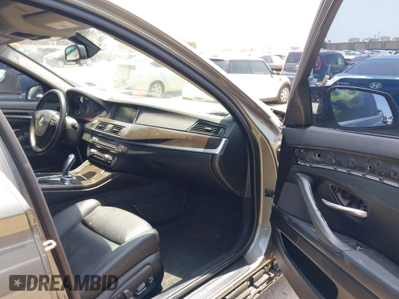 2014 BMW 5 Series 535i xDrive with VIN WBA5B3C57ED531072, listed as a IAAI auction lot 42574991 with 104,304 mi miles and . Bid and sale history available at DreamBid. Image 5.