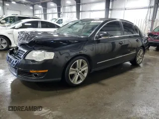 2010 Volkswagen Passat z VIN WVWJK9AN4AE096359, wystawiony jako Copart lot #50740075 z przebiegiem 196 126 mil mil oraz Szkoda całkowita • Salvage title. Historia ofert i sprzedaży dostępna na DreamBid. Obrazek 1.